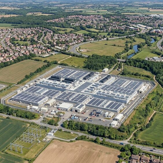 An aerial view of a data centre campus in open country